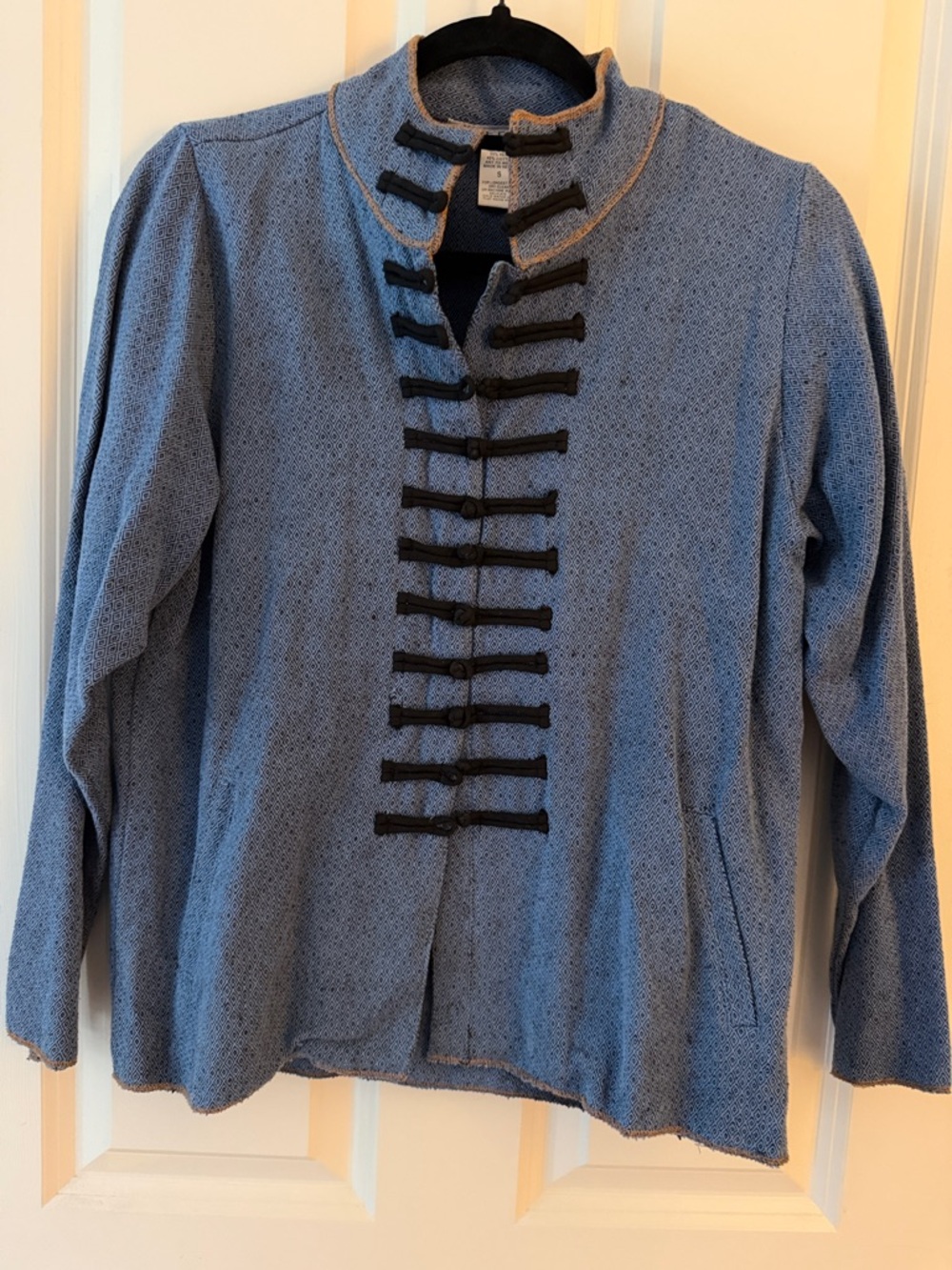 Tribe Light Blue Textured Jacket with Black Trim. Size Small w/pockets